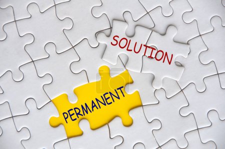 Permanent Solution text on missing jigsaw puzzle. Problem solving concept.