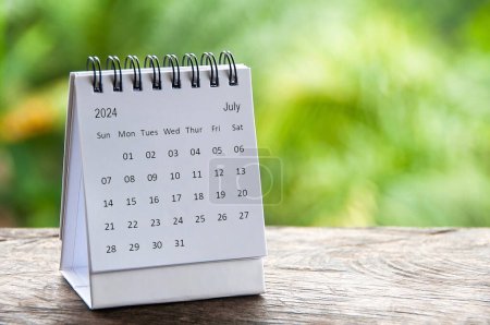Photo for July 2024 white table calendar with customizable space for text. Calendar and copy space concept. - Royalty Free Image