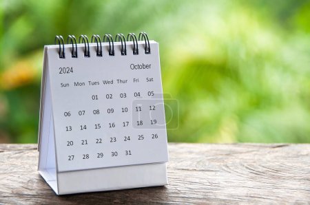 October 2024 white table calendar with customizable space for text. Calendar and copy space concept.