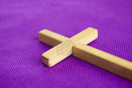 Photo for Lent Season and Holy Week concept - A Christian cross on purple background. Good Friday Concept. - Royalty Free Image