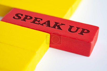 Photo for Speak up text on red wooden blocks on dark background. Speak up culture concept. - Royalty Free Image