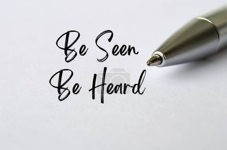 Be Seen Be Heard text with bold pen background.