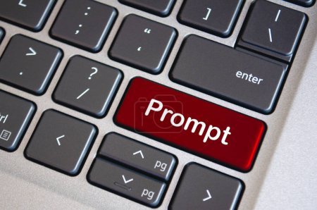Prompt text on red laptop keyboard. Prompt concept.