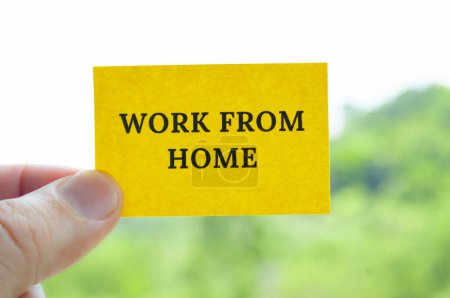 Work from home text on yellow notepad. Work from home concept.
