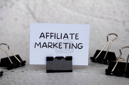 Affiliate marketing text on standing white paper.