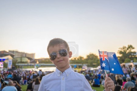 Foto de Two Australian kids watching  Australia Day Celebration concert in Adelaide city - Imagen libre de derechos
