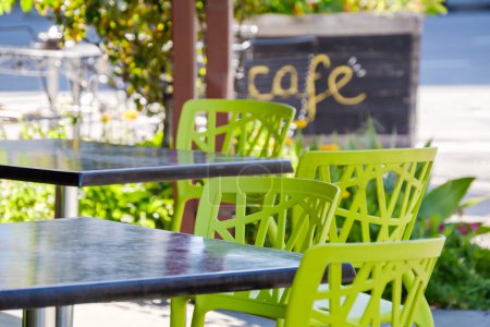 Photo for Colourful outdoor cafe seating tables and chairs in Adelaide city centre, South Australia - Royalty Free Image