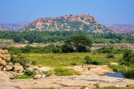 Photo for View of Anjaneya hill in Hampi. This place is supposed to be the birthplace of Lord Hanumana. Hampi is a UNESCO World Heritage site. - Royalty Free Image