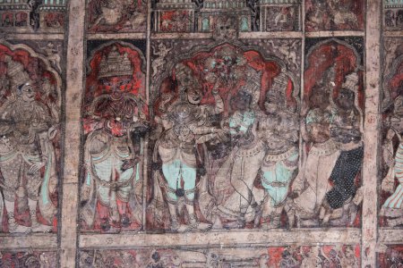 Photo for Mural of wedding of Shiva and Parvati painted on the ceiling of Virupaksha Temple in Hampi. Hampi, the capital of Vijayanagara Empire is a UNESCO World Heritage site - Royalty Free Image