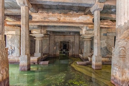 Photo for Prasanna Virupaksha or Underground Shiva Temple, Hampi. Hampi, the capital of the ancient Vijayanagara Empire, is a UNESCO World Heritage site. - Royalty Free Image