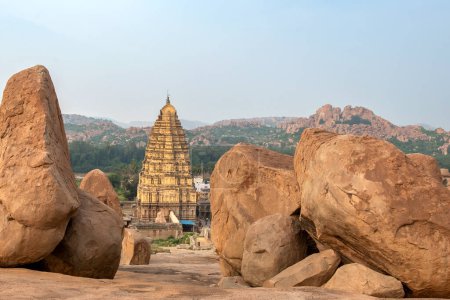 Photo for Virupaksha Temple dedicated to lord Shiva is located in Hampi in Karnataka, India. Hampi, the capital of Vijayanagar Empire is a UNESCO World Heritage site. - Royalty Free Image