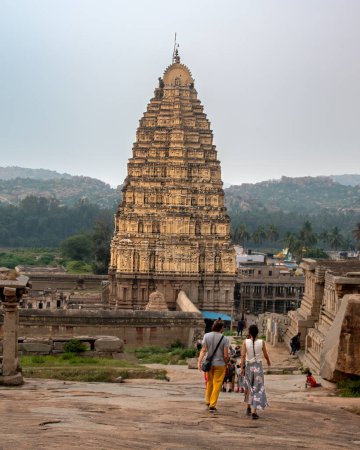 Photo for Hampi, Karnataka, India - Nov 2 2022: Virupaksha Temple dedicated to lord Shiva is located in Hampi in Karnataka, India. Hampi, the capital of Vijayanagar Empire is a UNESCO World Heritage site. - Royalty Free Image
