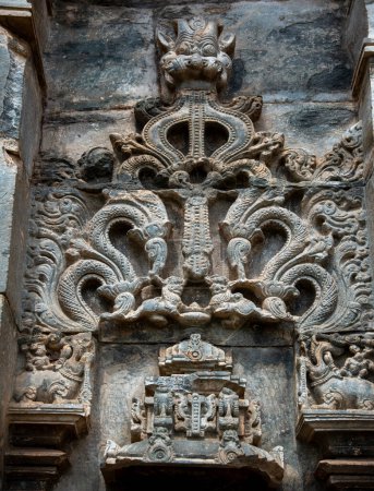 Photo for Beautiful carving on the outer walls of Brahma Jinalaya Temple in Lakkundi. It is an early 11th-century Mahavira temple in Gadag District of Karnataka, India - Royalty Free Image