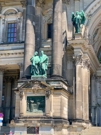 Photo for Copper statues of Disciples Matthew and Mark designed by Gerhard Janensch and Johannes Gotz outside the Berliner Dom - Royalty Free Image