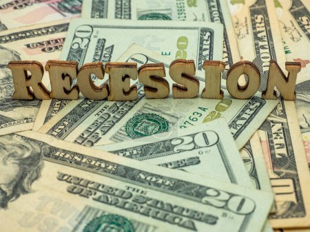 word recession over multiple dollar bills