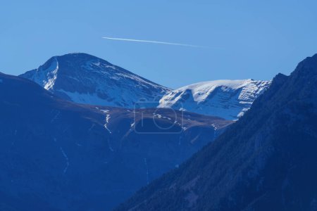 Photo for Snow-capped mountain of Mont Lost with mountains with trees in the foreground - Royalty Free Image