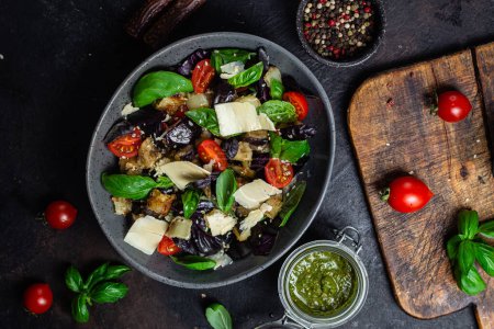 Photo for Eggplant salad, basil, cheddar cheese with tomatoes - Royalty Free Image
