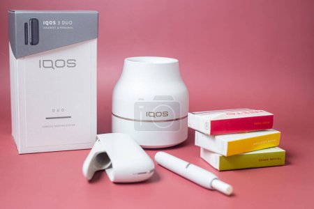 Photo for IQOS 3 duo white. Sticks in packs for smoking - Royalty Free Image