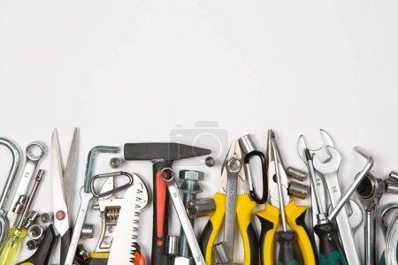 Photo for Set of tools for repair in a case on a white background. Assorted work or construction tools. Wrenches, Pliers, screwdriver. Top view - Royalty Free Image