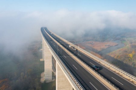 Photo for Aerial view about the famous Viaduct of Koroshegy covered by fog, near lake Balaton. - Royalty Free Image