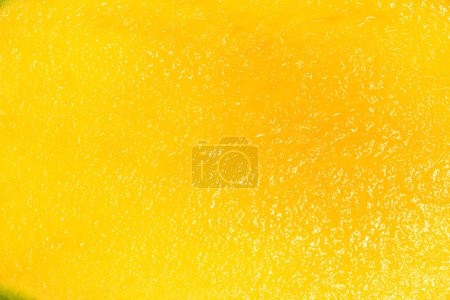 Closeup detail texture cut slice of fresh organic green mango fruit