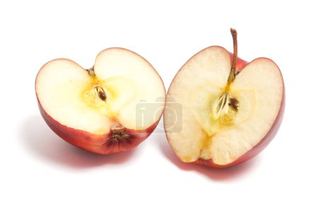 Half cut fresh organic red apple delicious fruit side view isolated on white background clipping path