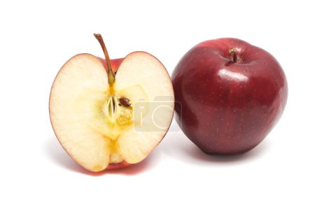 Half cut and whole fresh organic red apple delicious fruit isolated on white background clipping path