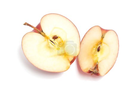 Half cut sliced fresh organic red apple delicious fruit isolated on white background clipping path