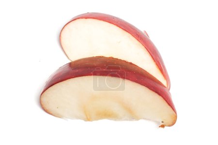 Sliced fresh organic red apple delicious fruit isolated on white background clipping path