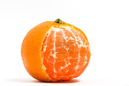 Photo for Half peeled a whole fresh organic orange delicious fruit isolated on white background clipping path - Royalty Free Image