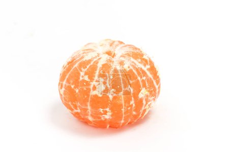 Peeled fresh organic orange delicious fruit side view isolated on white background clipping path