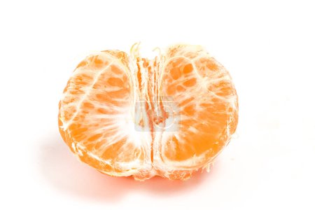 Half cut peeled fresh organic orange delicious fruit isolated on white background clipping path