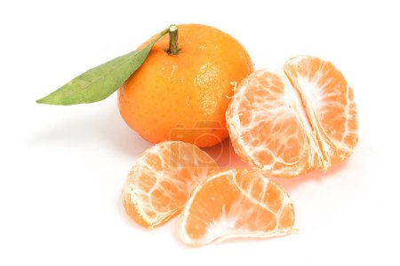 Half cut peeled and whole fresh organic orange delicious fruit side view with green leaves isolated on white background clipping path