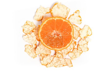 Peel and half cut fresh organic orange delicious fruit top view isolated on white background clipping path