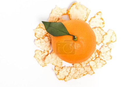 Peel and whole fresh organic orange delicious fruit top with green leaves view isolated on white background clipping path