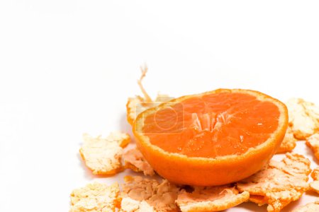 Close-up peel and half cut fresh organic orange delicious fruit isolated on white background clipping path