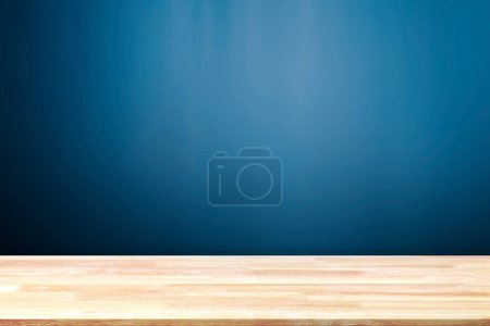 Téléchargez les photos : Abstract Natural wood table texture on blue background : Top view of plank wood for graphic stand product, interior design or montage display your product - en image libre de droit