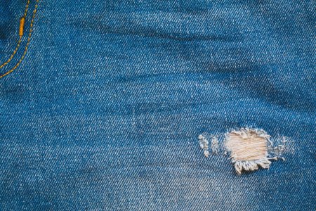 Téléchargez les photos : Couleur rétro ton de jeans en denim bleu texture de tissu pour le site de fond design de mode ou de toile de fond produit. - en image libre de droit