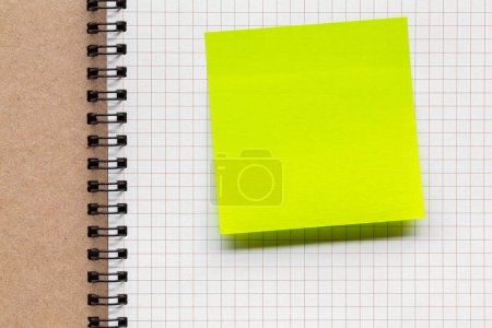 Photo for White note paper bookmark with sticker note on book lined pages. - Royalty Free Image