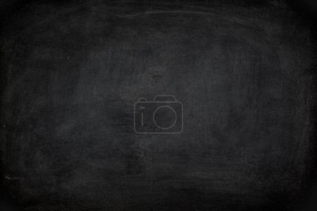Foto de Abstract Chalk rubbed out on blackboard or chalkboard texture. clean school board for background or copy space for add text message. Backdrop of Education concepts. - Imagen libre de derechos