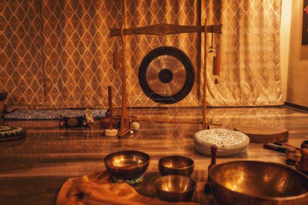 Photo for Beautiful tibetan bowl ready for meditative music - Royalty Free Image