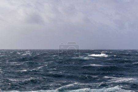 Photo for Beautiful seascape - waves and sky with clouds with beautiful lighting. Stormy sea, Bad weather. Gale. Rough sea. - Royalty Free Image