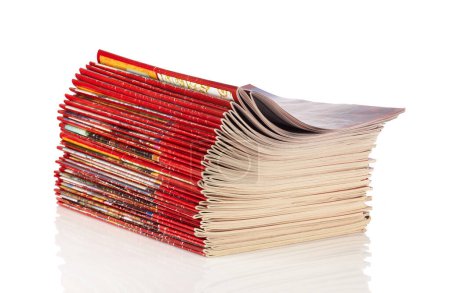 Photo for A stack of magazines in red isolated on white background. - Royalty Free Image