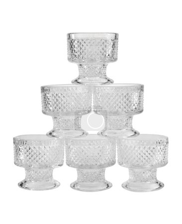 Photo for Pyramid of crystal glasses isolated on a white background - Royalty Free Image