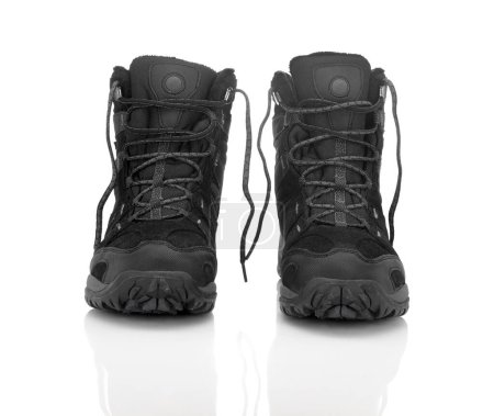 Photo for Sturdy shoes for hiking over rough terrain isolated on white background - Royalty Free Image