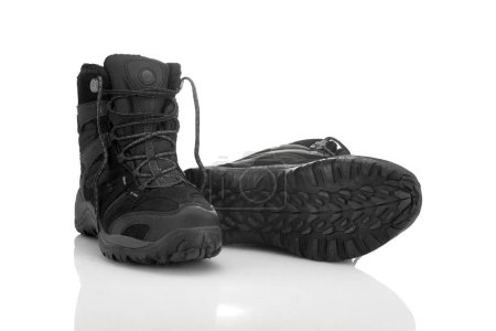 Photo for Sturdy shoes for hiking over rough terrain isolated on white background - Royalty Free Image
