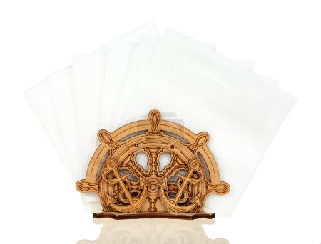 Photo for Clean towels in a wooden holder isolated on white background. The holder of the wheel for maritime. - Royalty Free Image