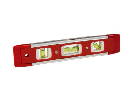 Photo for Red spirit level with three levels and aluminum ruler - Royalty Free Image