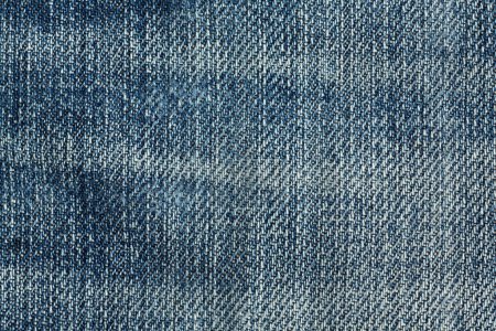 Photo for The texture of blue jeans fabric photographed close up - Royalty Free Image
