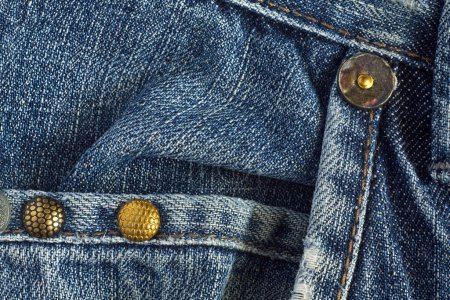 Photo for Texture of blue denim material. Some close-up pants. - Royalty Free Image